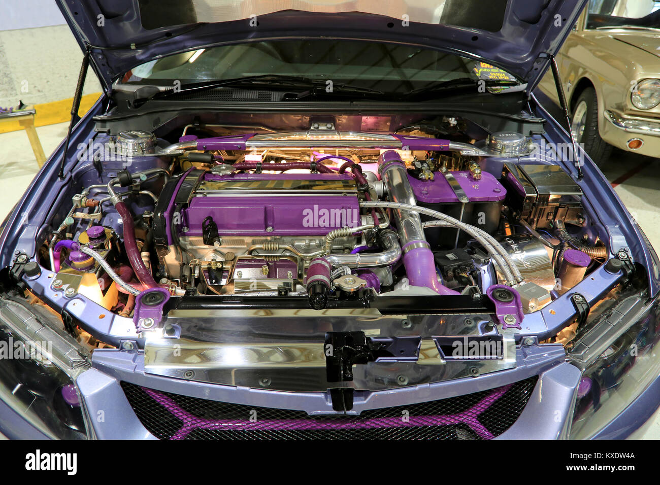 LOIMAA, FINLAND - JUNE 15, 2014:  Show car with open hood and tuned engine compartment at HeMa Show 2014 in Loimaa, Finland. Stock Photo
