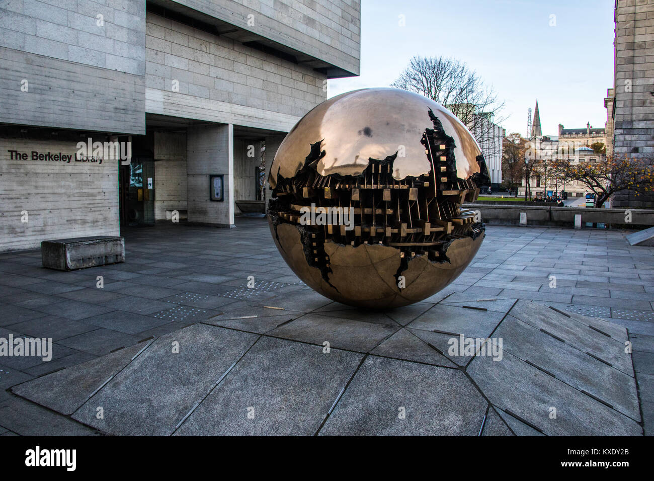 Sphere with Sphere by Arnaldo Pomodoro, Trinity College, Dublin, Ireland Stock Photo