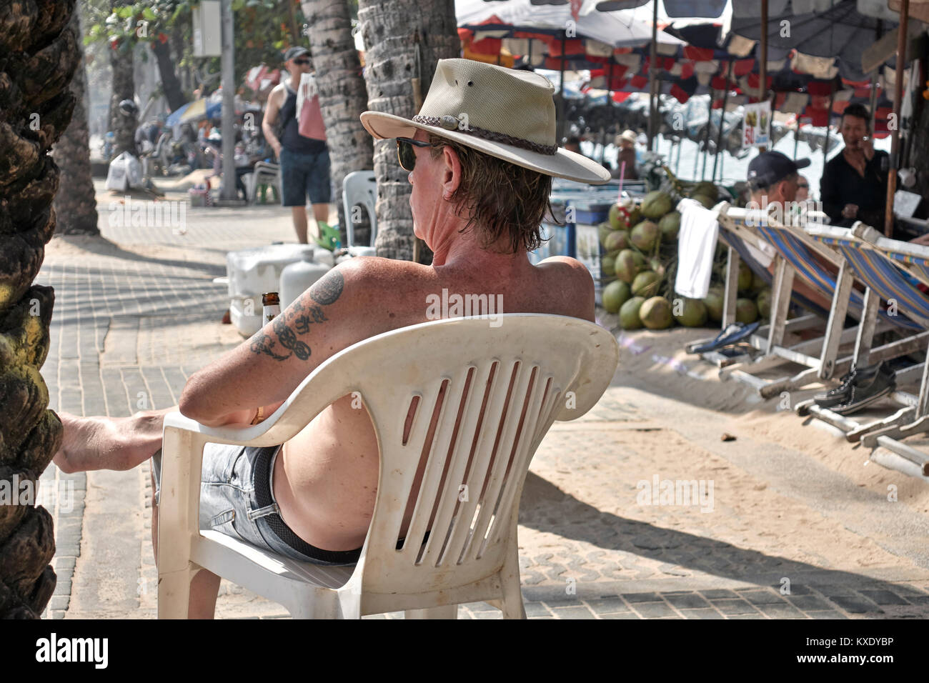 Man relaxing outside and passing the time of day. Stock Photo