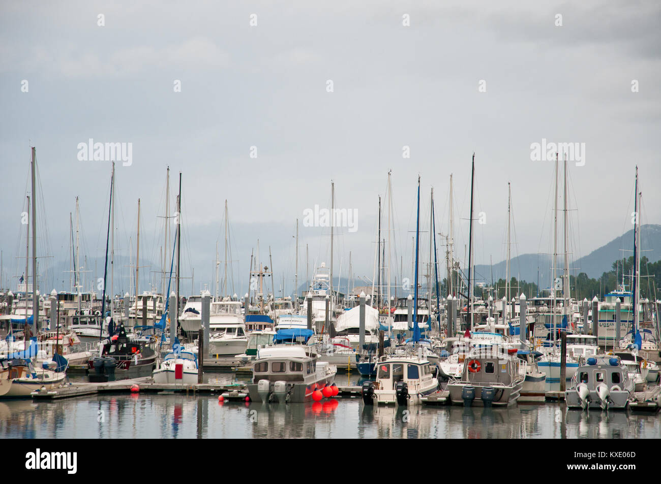 View of sailing boats parked in the harbor near Prince William Sound in Alaska. Stock Photo