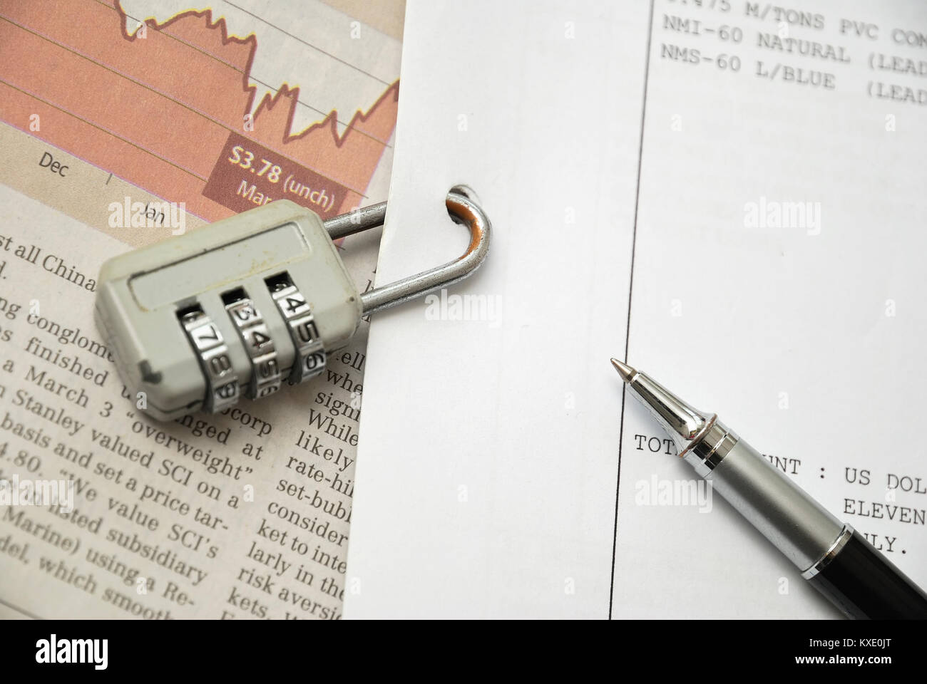 Closeup of number lock on important business documents signifying ...