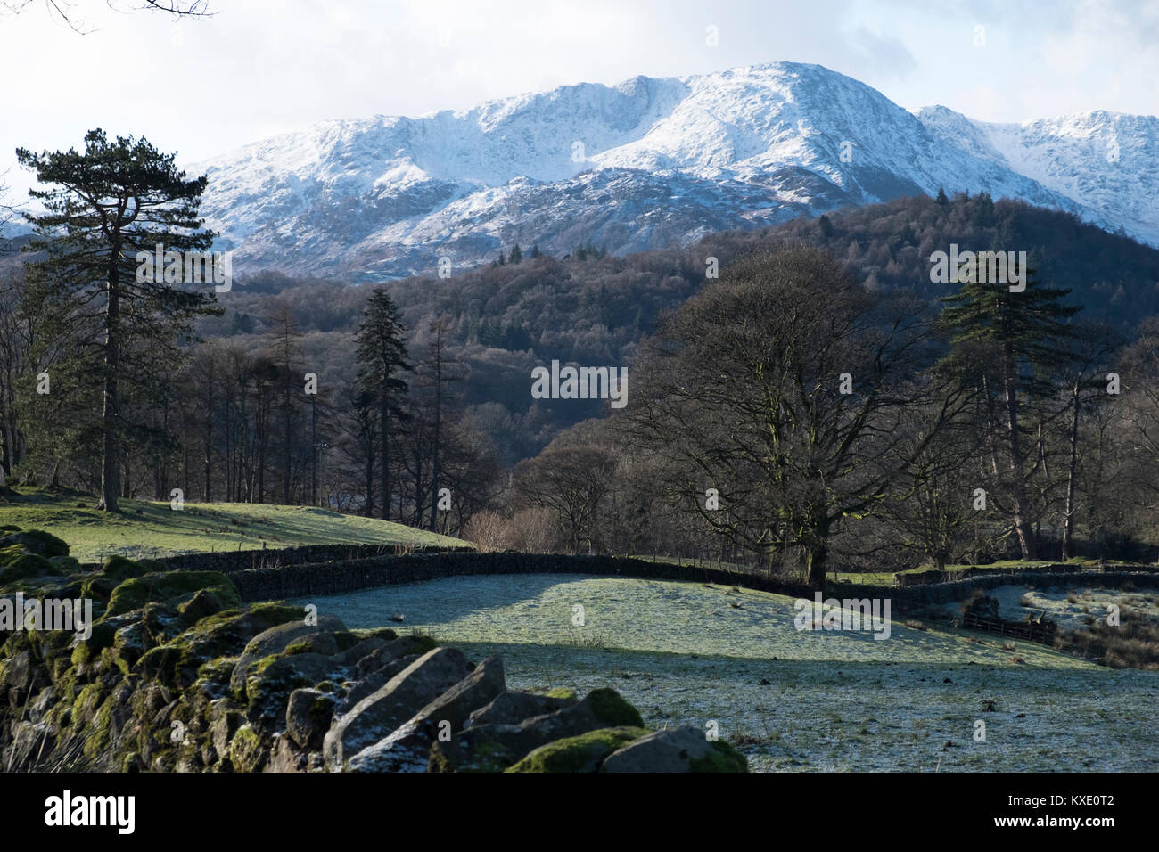 Wetherlam in snow from near Loughrigg, Lake District, England Stock Photo