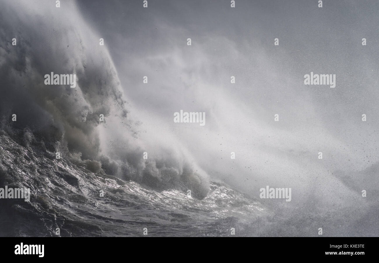 Huge waves rebounding off the harbour wall at Newhaven, Sussex, during a storm Stock Photo