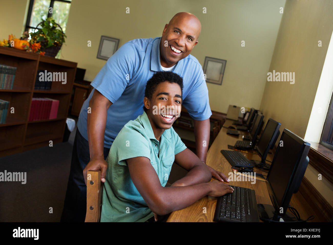 Young man getting tutoring. Stock Photo