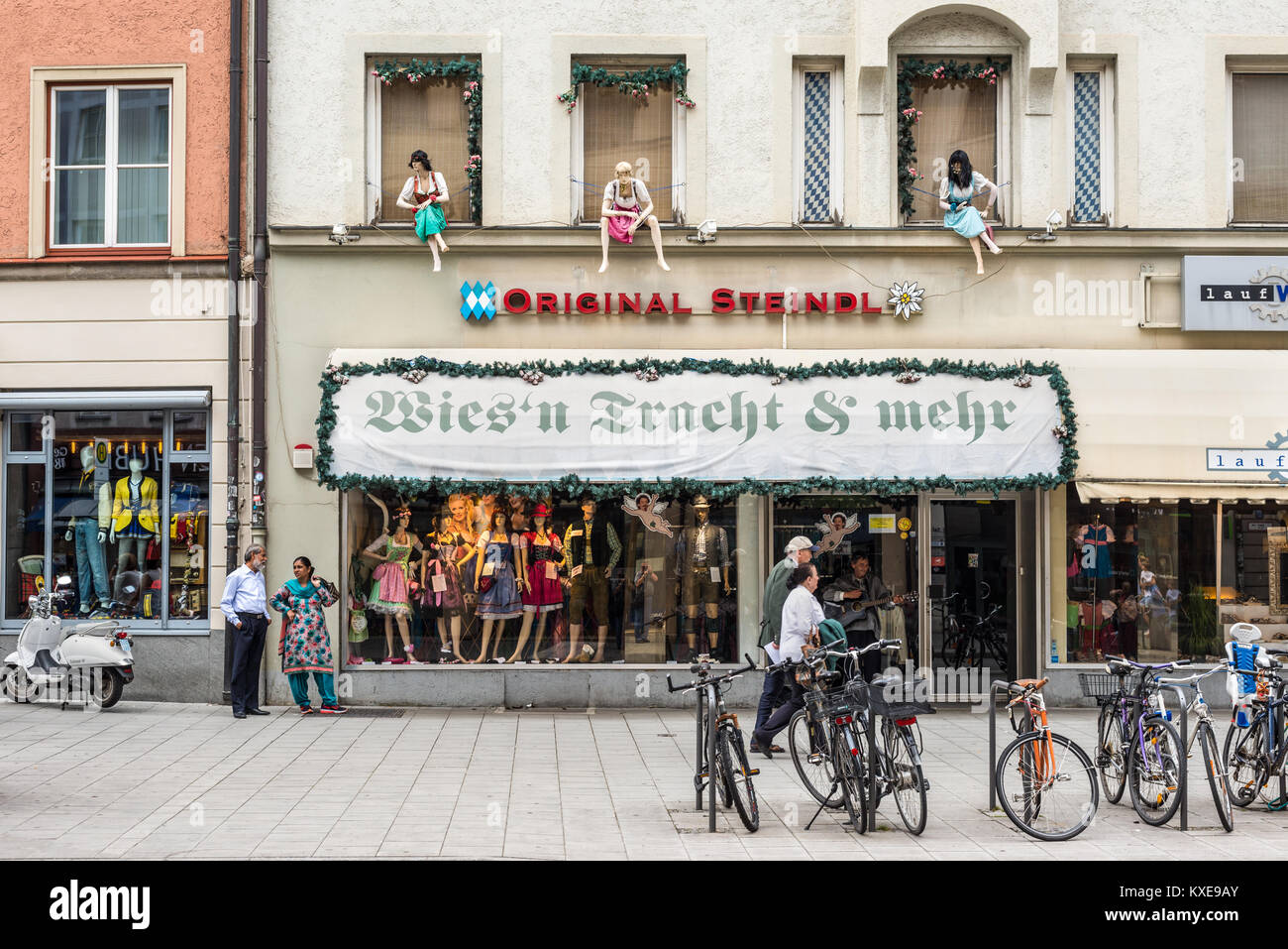 Munich, Germany May 29, 2016 People in the street passing next to