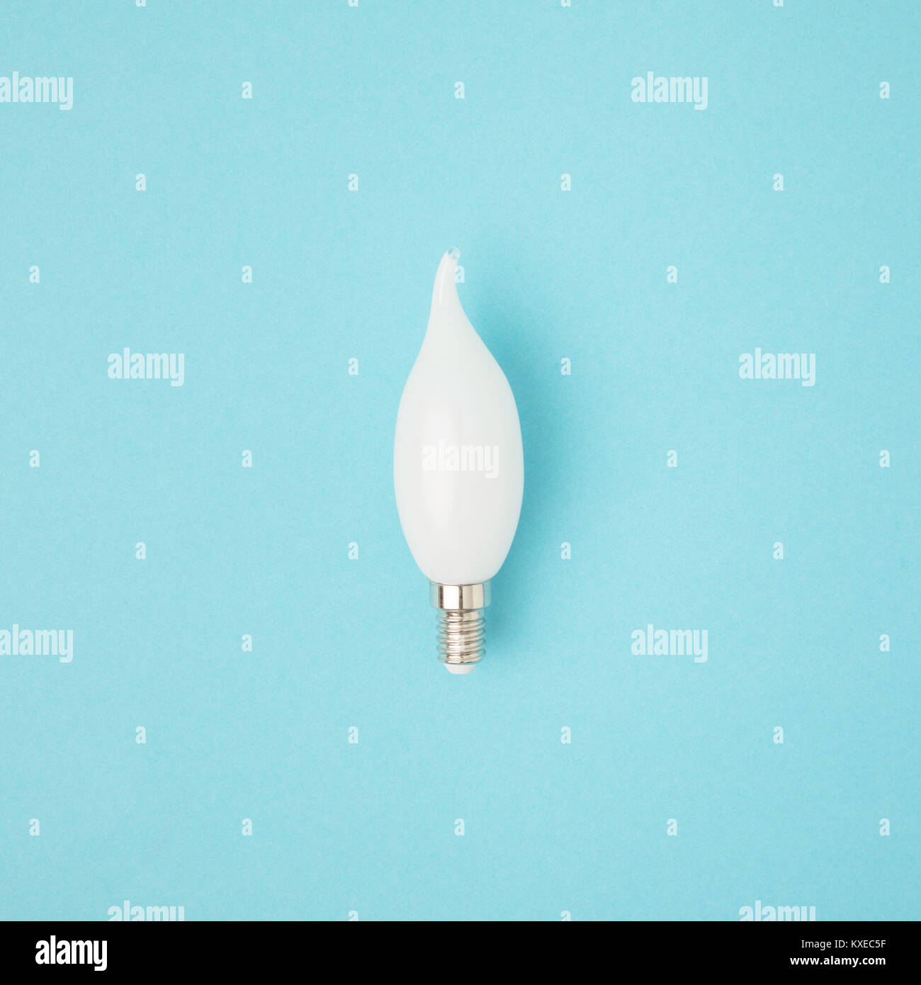 close up view of white light bulb isolated on blue Stock Photo - Alamy