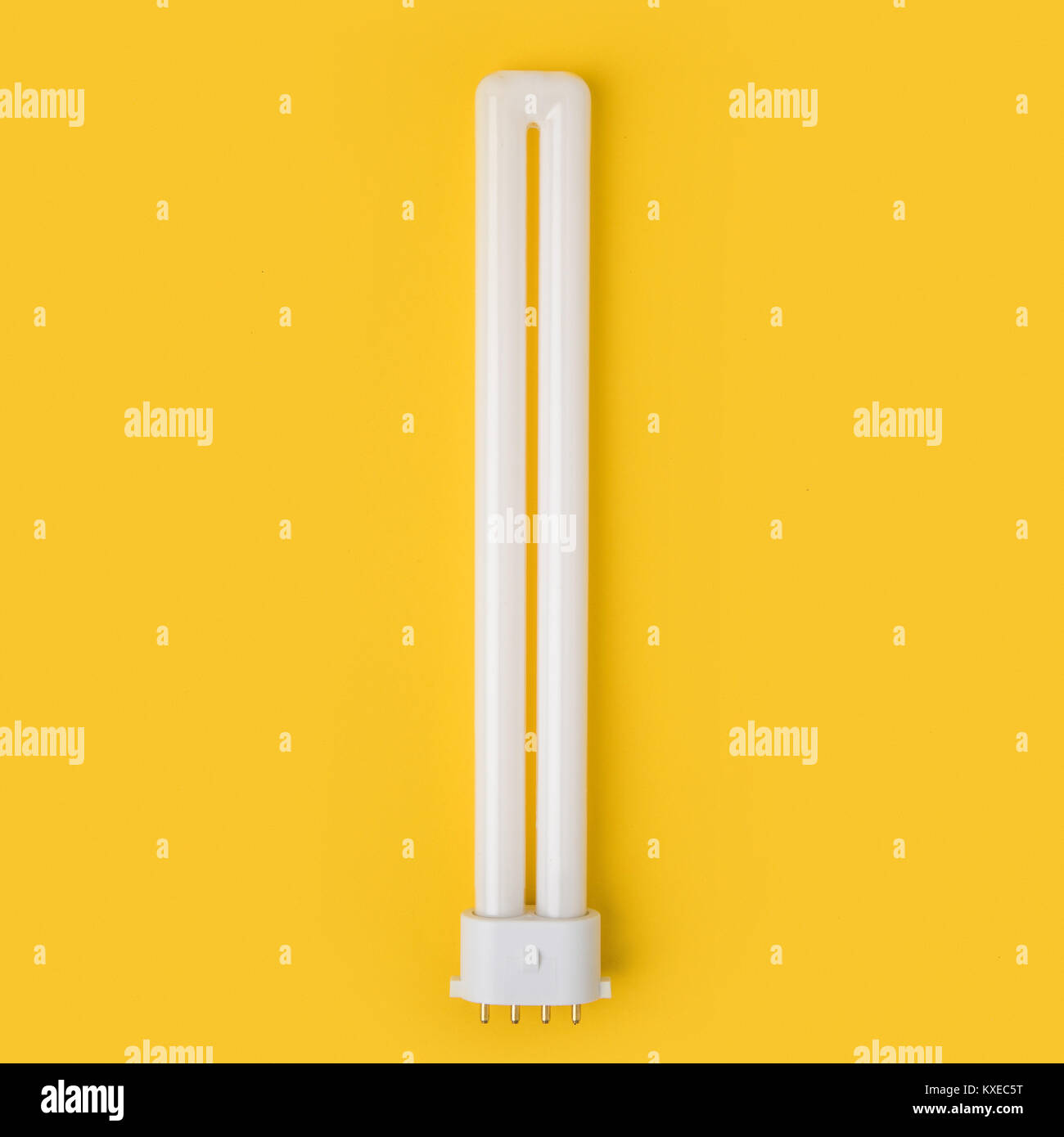 close up view of white light bulb isolated on yellow Stock Photo - Alamy