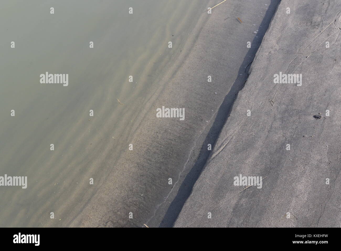 Interesting patterns in sand on a riverbed, sand Stock Photo