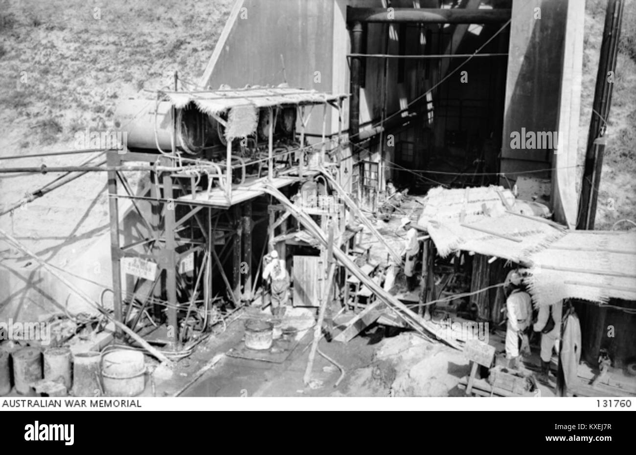 This photograph shows a reinforced concrete cavern built into a hillside at the former Tokyo 2nd Army Arsenal. It highlights the industrial and military architecture from the early 20th century, serving as a significant historical site. Stock Photo