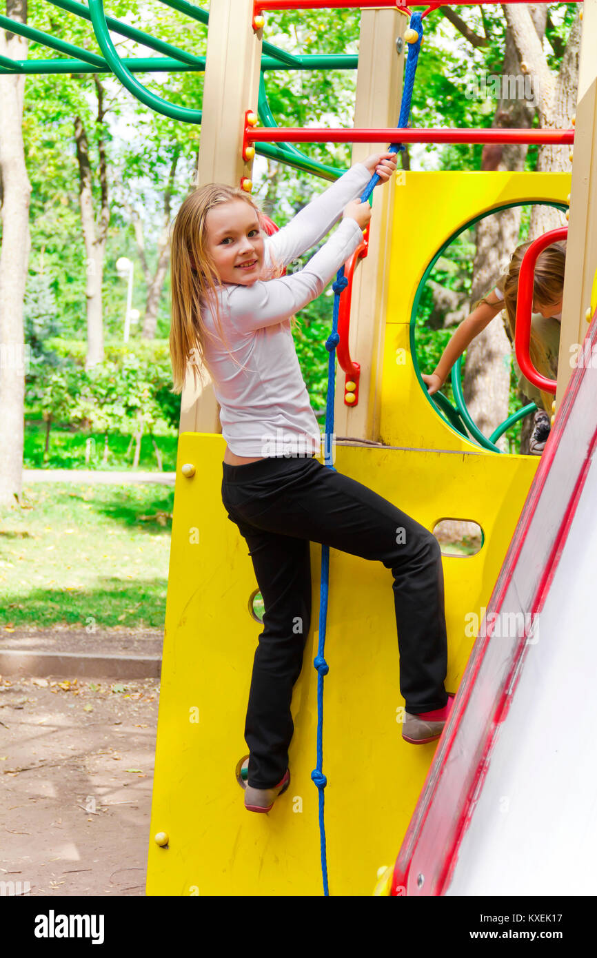 Photo of cute playing girl in summer Stock Photo - Alamy