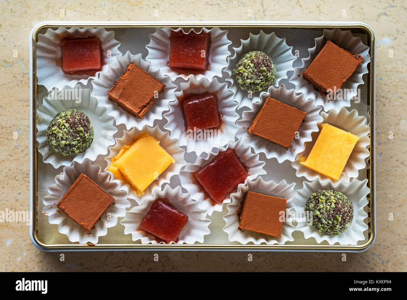 Handmade chocolates in a tin can,BadenWürttemberg,Germany Stock Photo