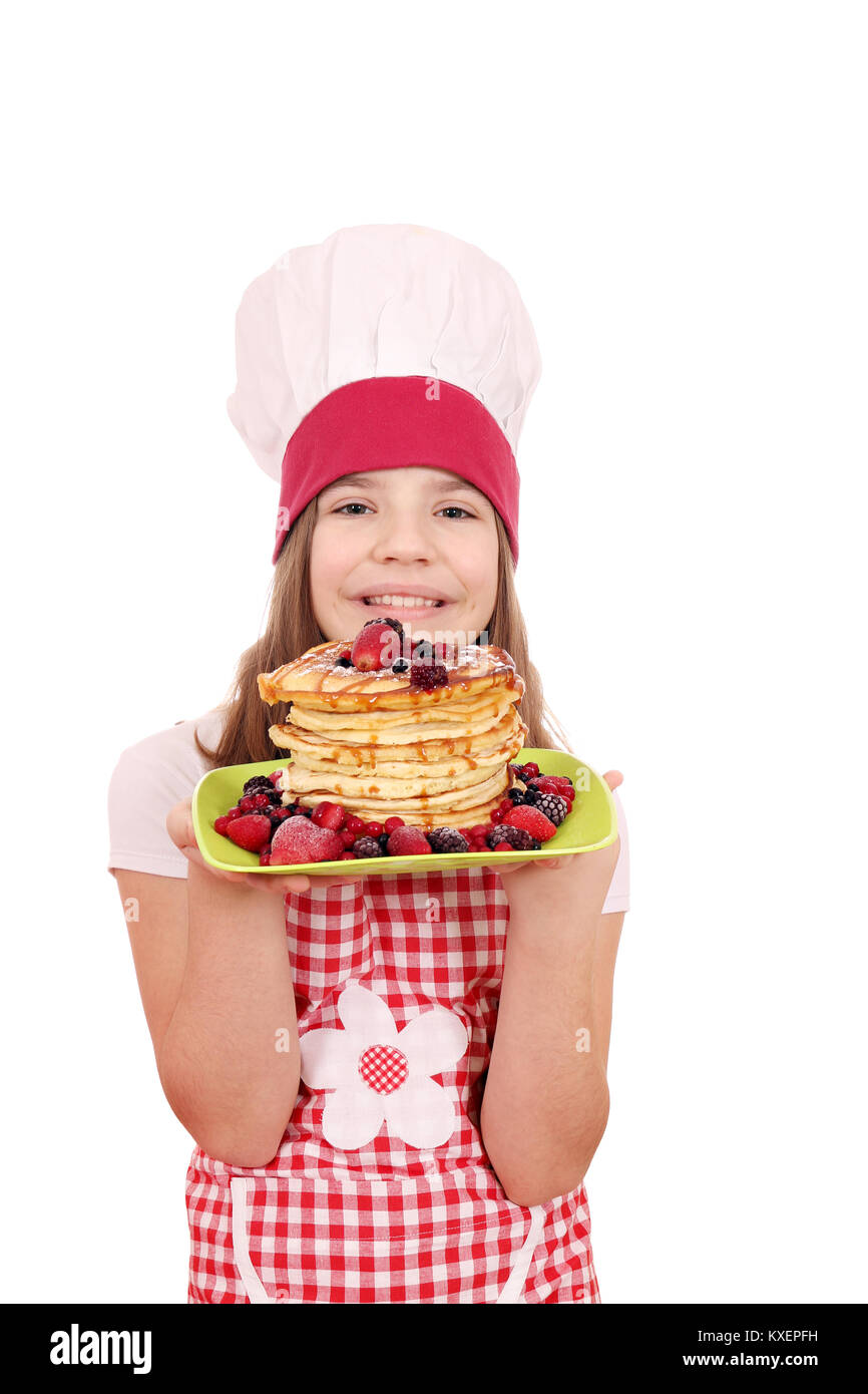 happy little girl cook with pancakes on plate Stock Photo Alamy