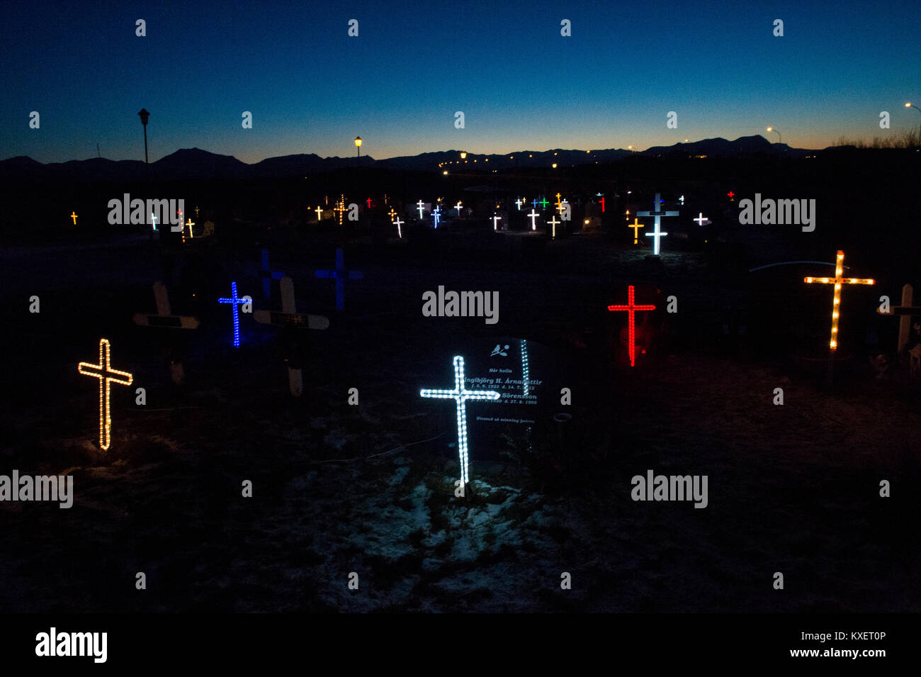 Illuminated cemetery in Iceland. Stock Photo