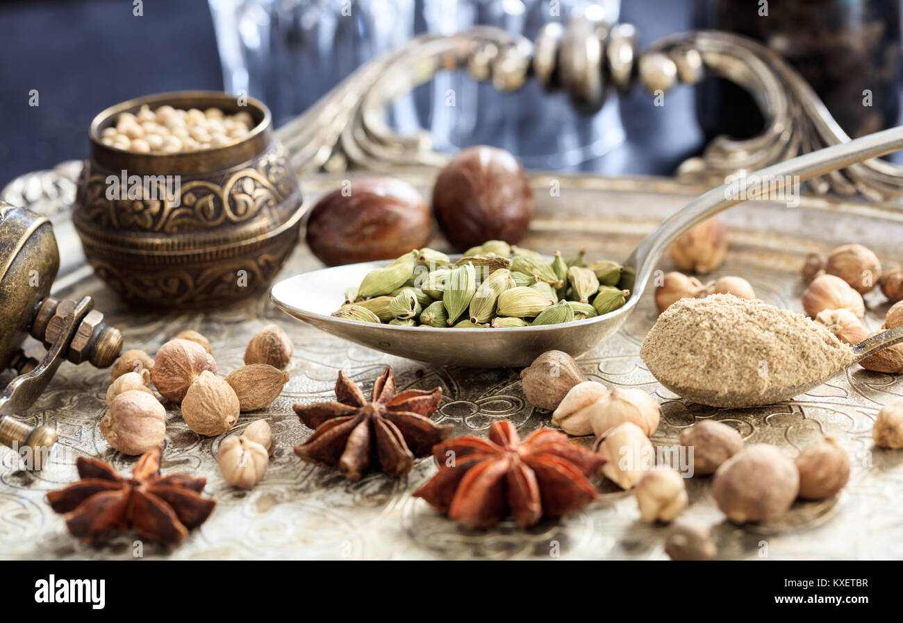 Cardamom seeds and powder in spoons Stock Photo Alamy