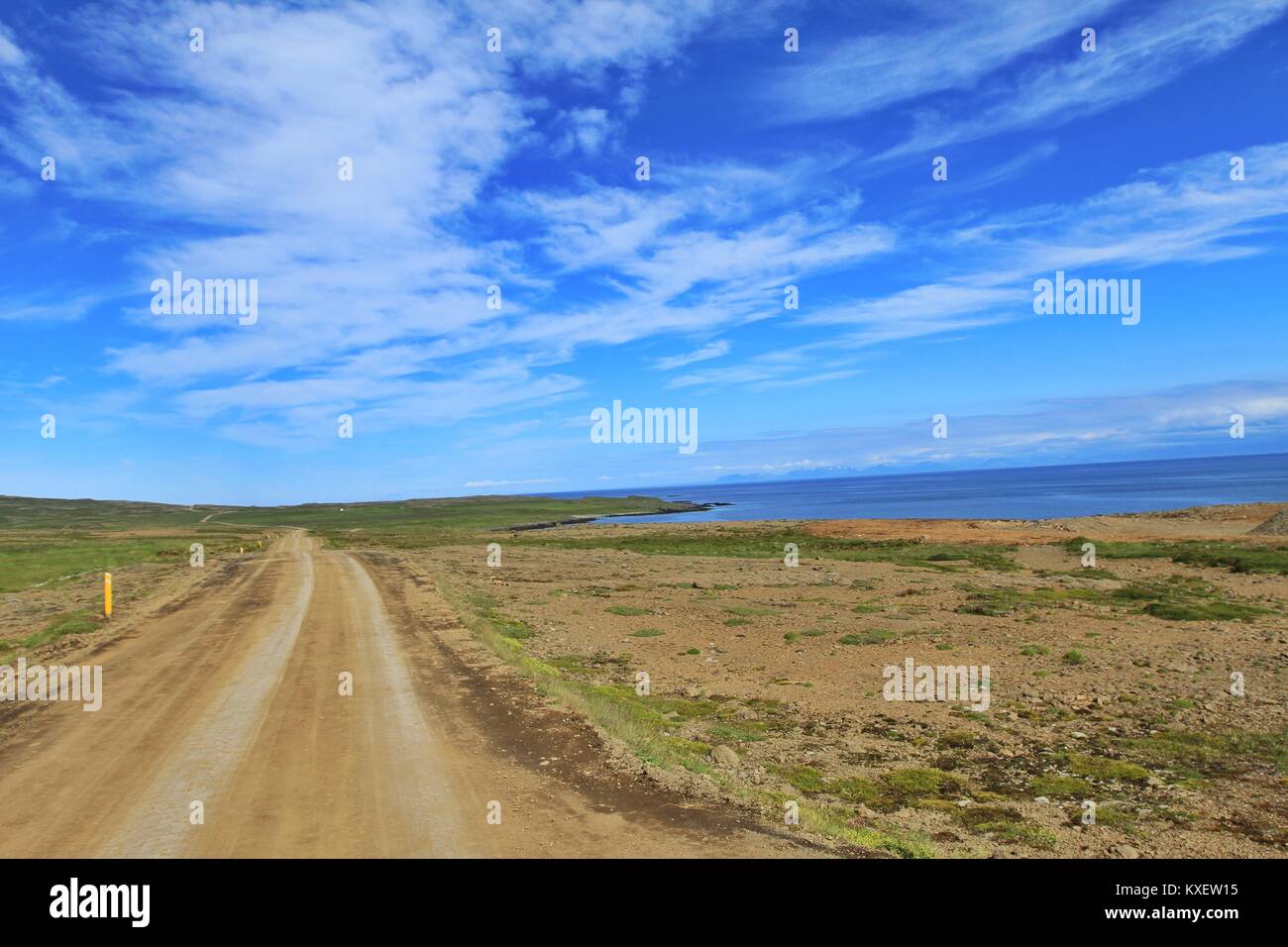 Bumpy Road in front og blue sky Stock Photo
