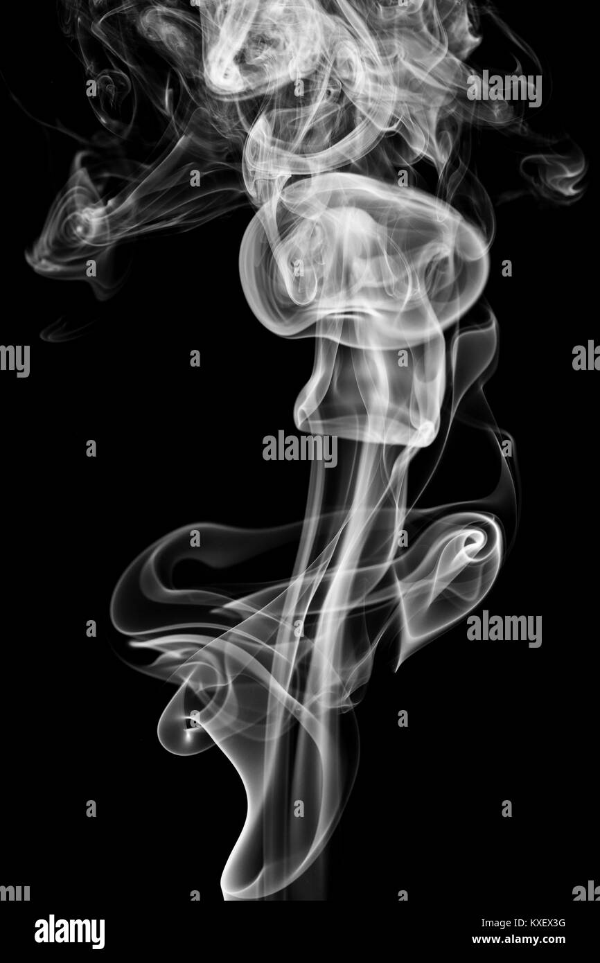 A Whisp Of White Smoke Against The Black Background Stock Photo Alamy