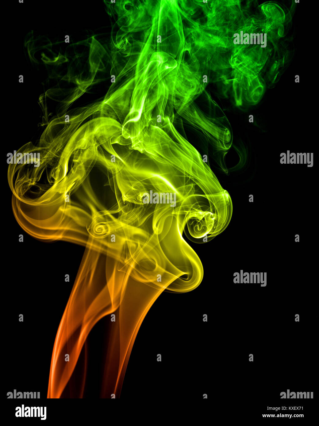A streams of colored smoke on black background Stock Photo - Alamy