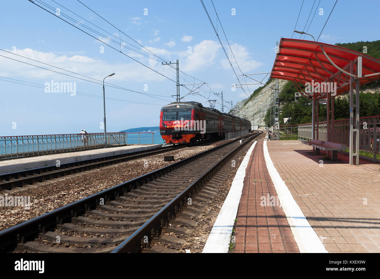 Dederkoy, Tuapse District, Krasnodar Region, Russia - July 9, 2013: The approaching train Tuapse - Adler Stock Photo