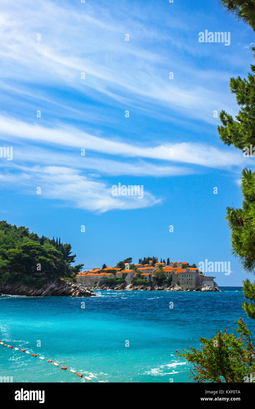 Picturesque summer view of Adriatic seacoast in Budva Riviera. Milocer beach (Milocer plaza). View to Sveti Stefan island, Montenegro Stock Photo