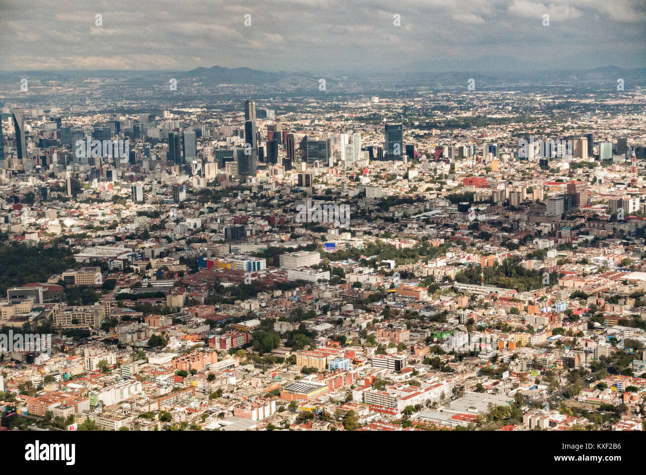 Aerial view showing the haze of pollution over the skyline and central city October 25, 2017 in Mexico City, Mexico. Mexico City is the capital of Mexico and and the most populous city North America. Stock Photo