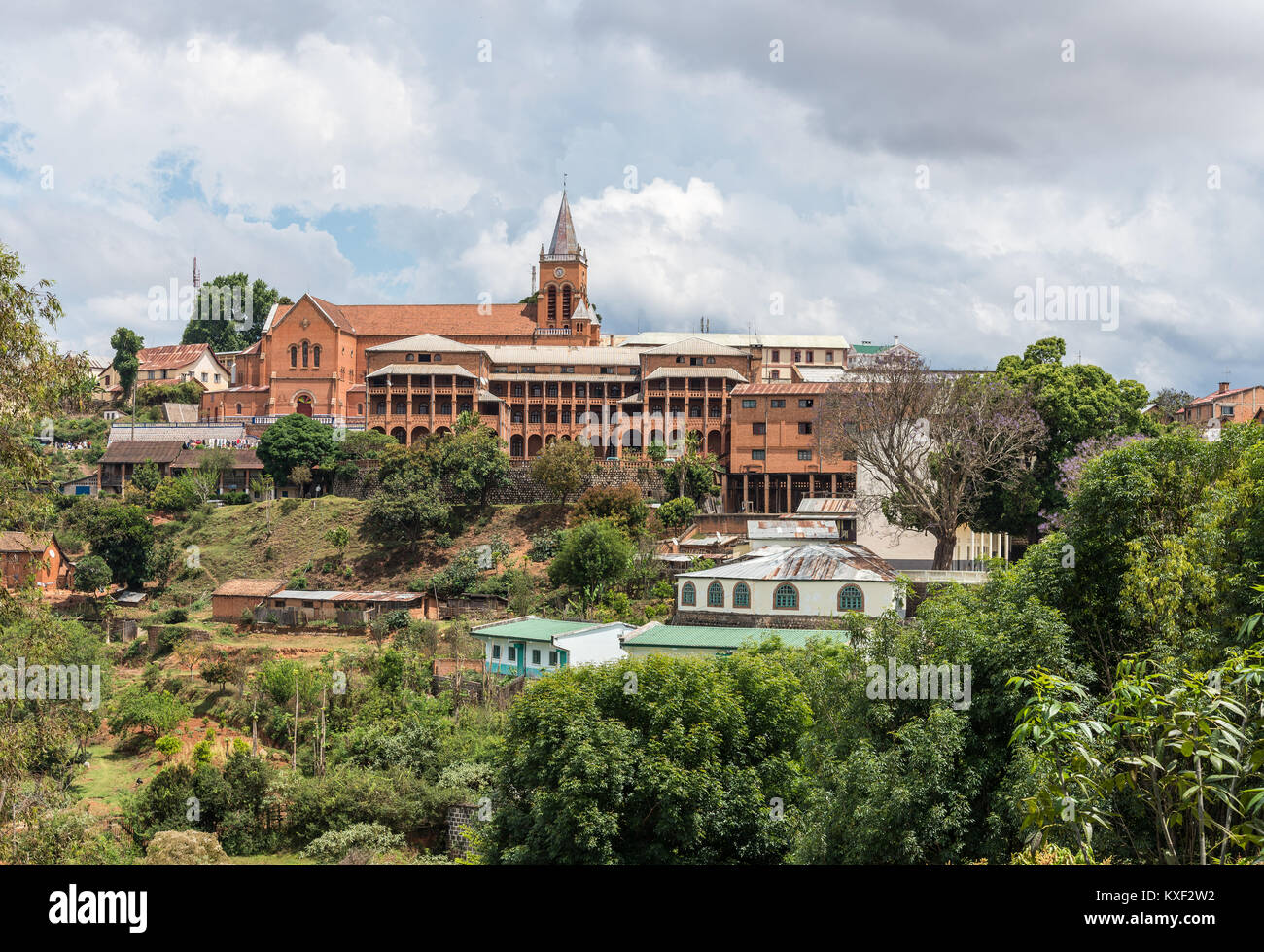A church stands on top of a hill in a small town. Madagascar, Africa. Stock Photo