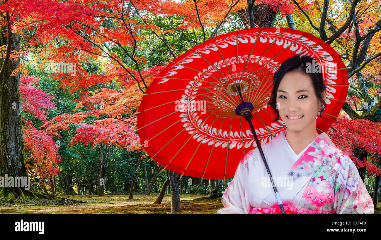 Young Japanese Woman in A Japanese Garden in Autumn Stock Photo