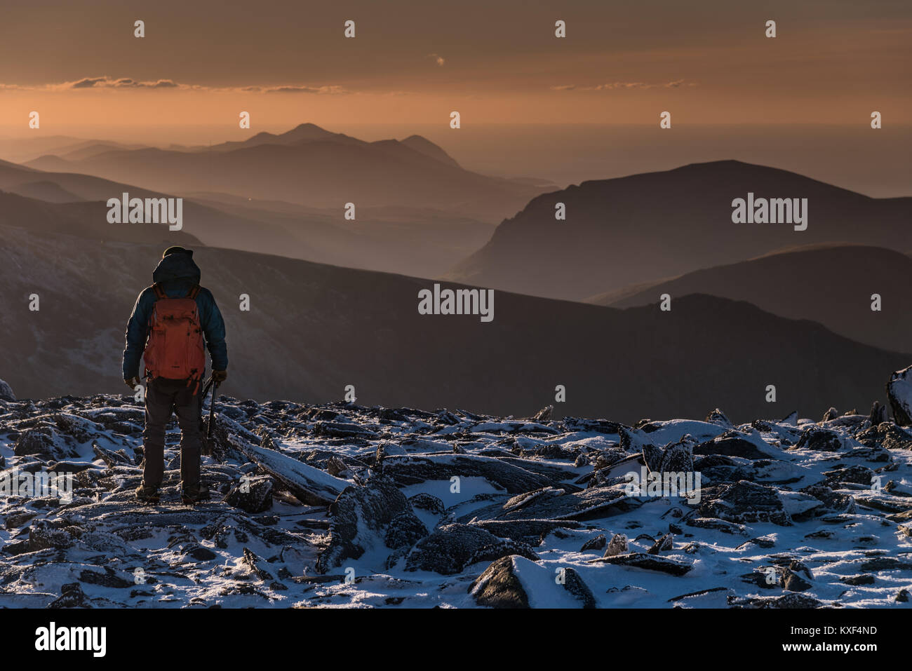 Mountaineering in snow in wales Stock Photo
