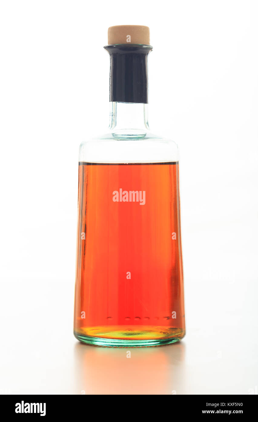 Bottle of red vinegar on white background Stock Photo