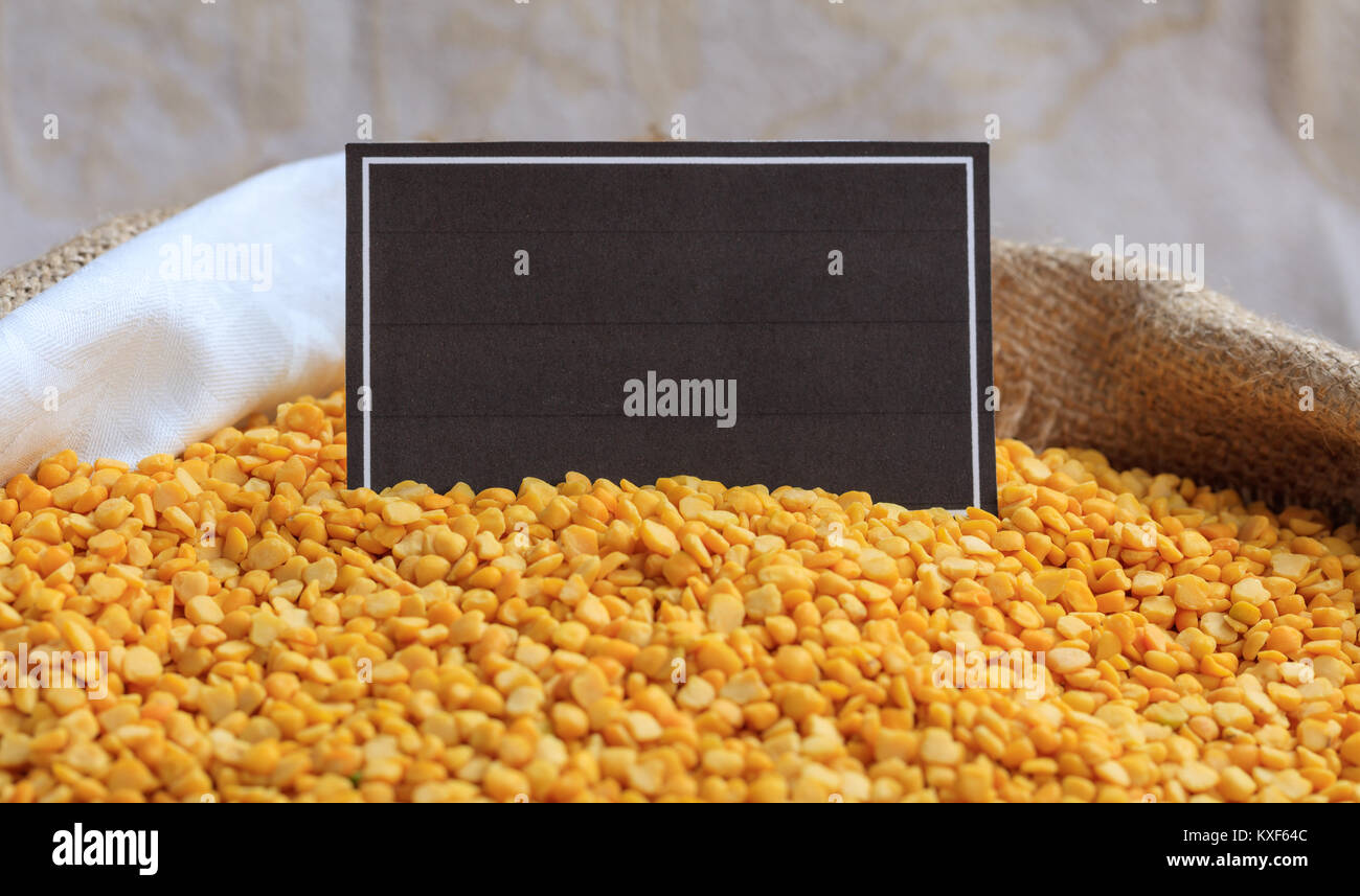 Raw split peas in a sack with a label Stock Photo Alamy