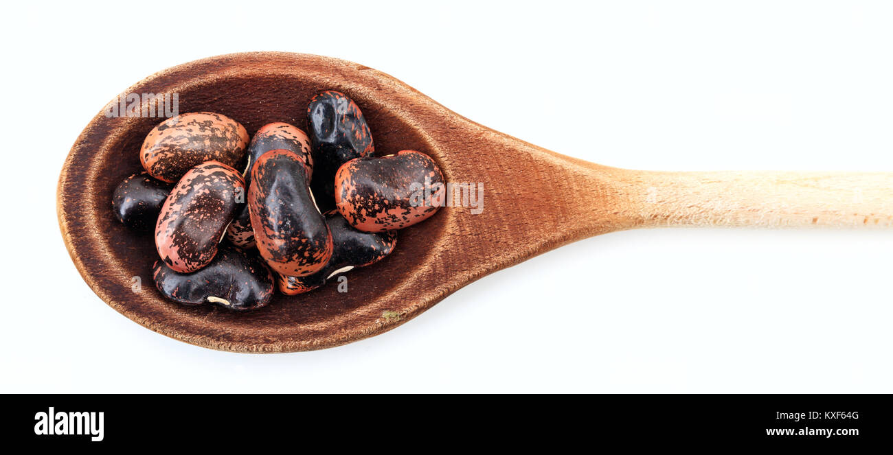 Raw lima beans in a wooden spoon on white background Stock Photo Alamy