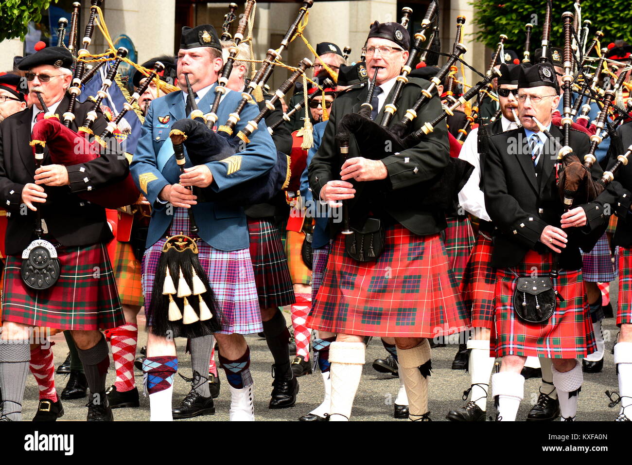 A Celtic marching parade of bagpipe blowers. Stock Photo