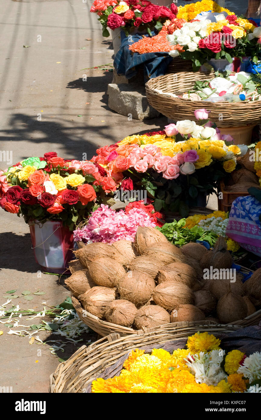 Street selling coconut and flower baskets for sale Stock Photo Alamy