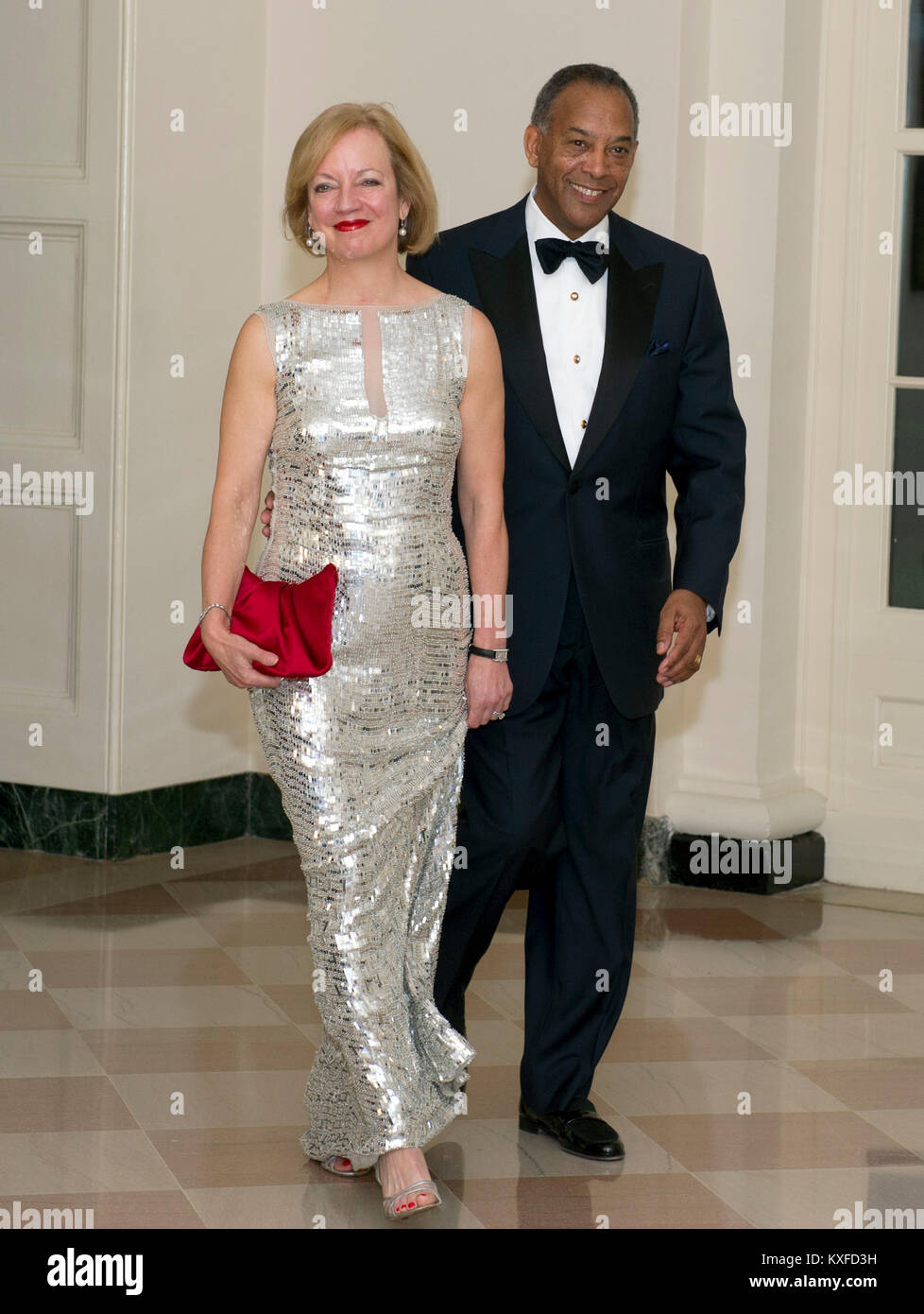 John W. Thompson, CEO of Virtual Instruments, and Sandi Thompson arrive for the Official Dinner in honor of Prime Minister David Cameron of Great Britain and his wife, Samantha, at the White House in Washington, D.C. on Tuesday, March 14, 2012. The Thompsons are two of United States President Barack Obama's biggest campaign fundraisers..Credit: Ron Sachs / CNP./ MediaPunch (RESTRICTION: NO New York or New Jersey Newspapers or newspapers within a 75 mile radius of New York City) Stock Photo