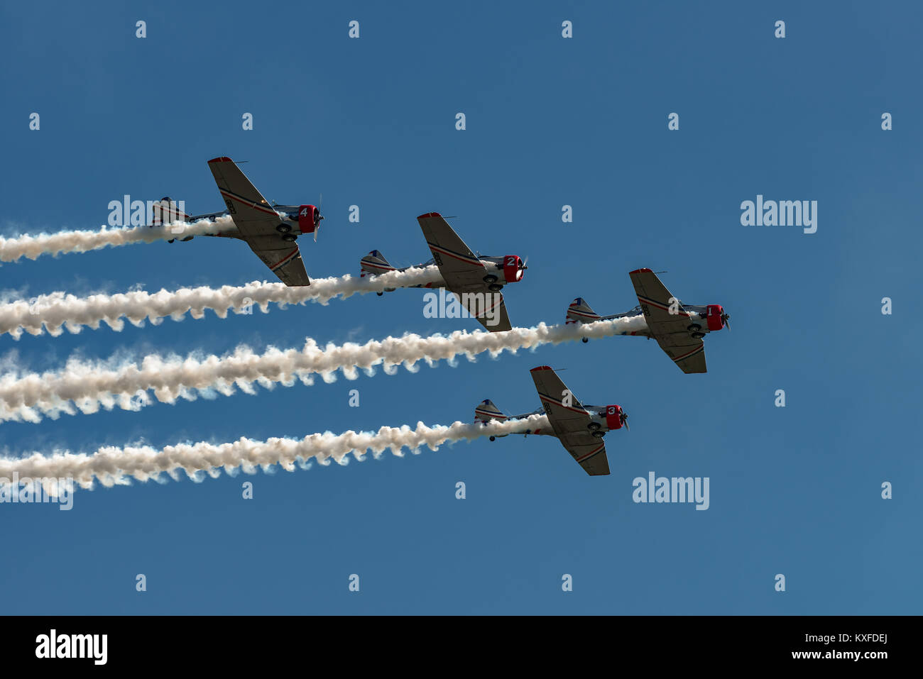 READING, PA - JUNE 3, 2017: The GEICO Skytypers in flight during World War II reenactment at Mid-Atlantic Air Museum Stock Photo