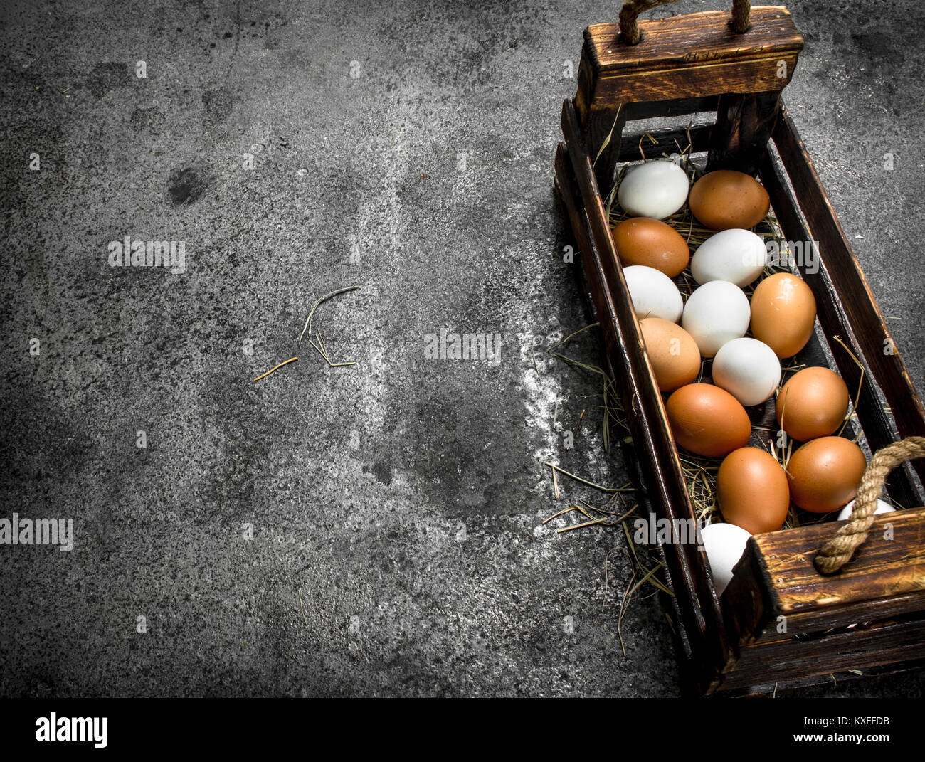 Fresh eggs in an old box. On a rustic background Stock Photo - Alamy