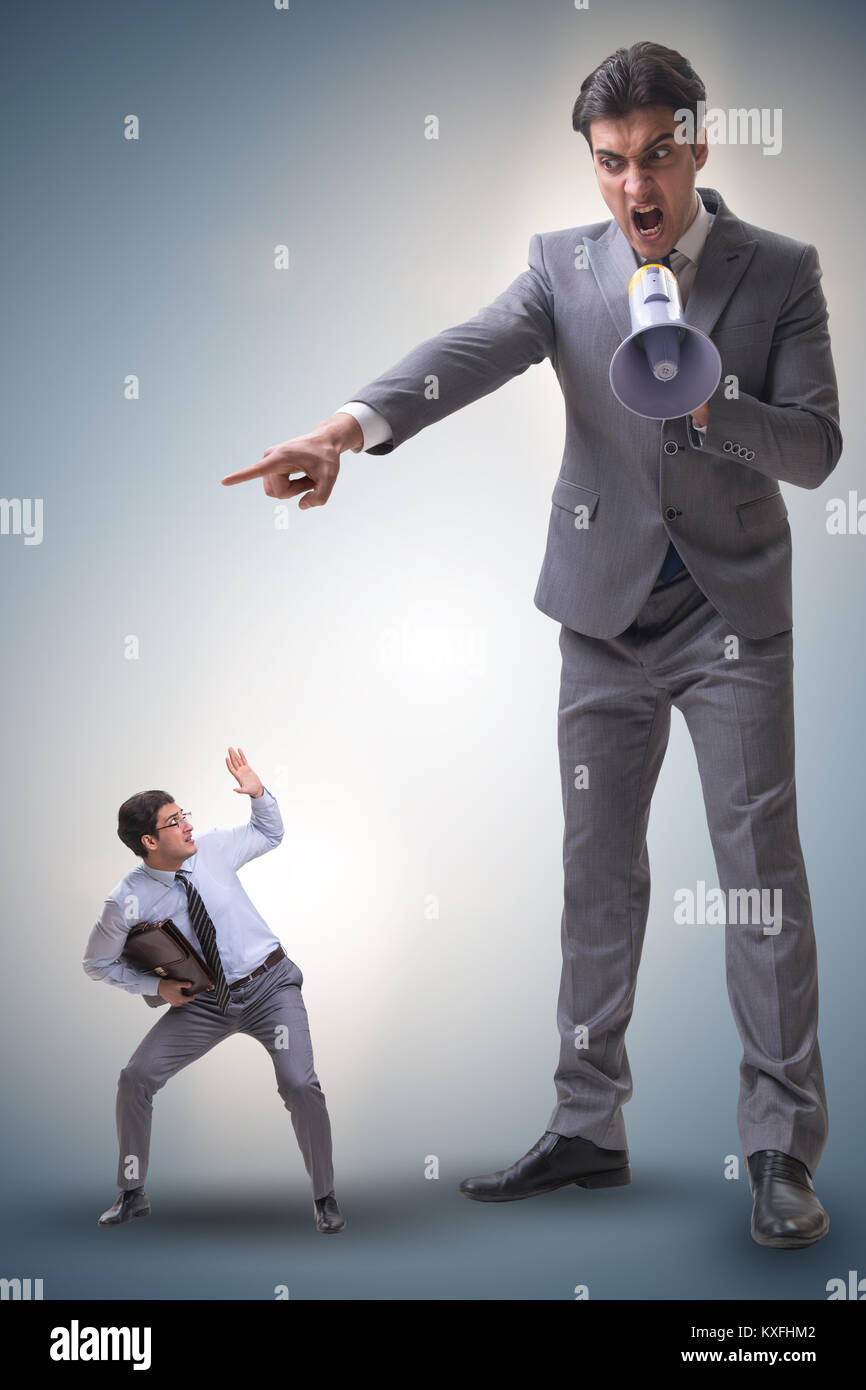 Bad angry boss shouting at employee with loudspeaker Stock Photo - Alamy
