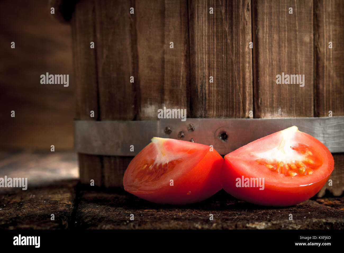 Fresh ripe tomatoes . On a wooden background Stock Photo - Alamy
