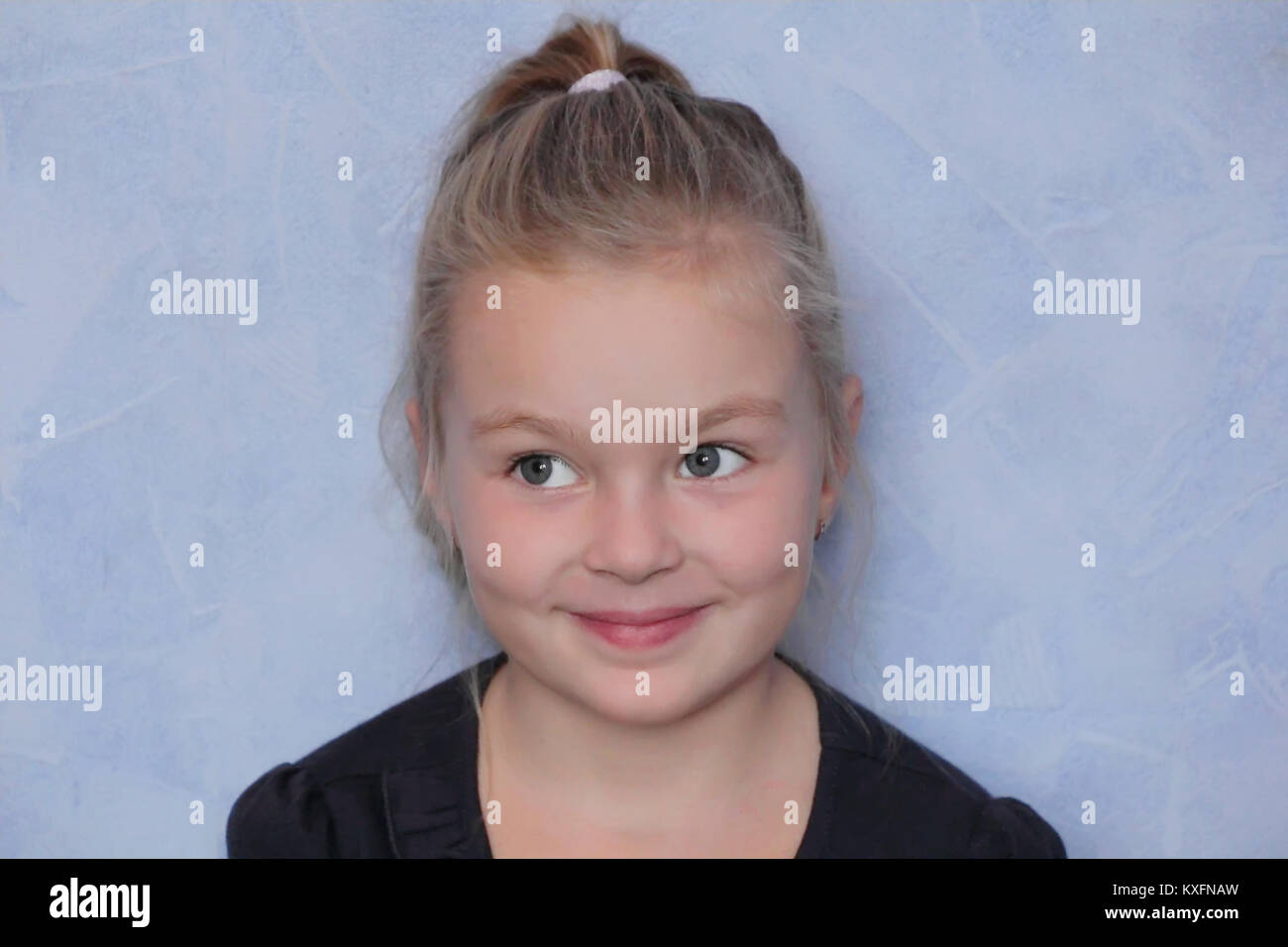 Portrait of beautiful girl with blond hair and blue eyes Stock Photo ...