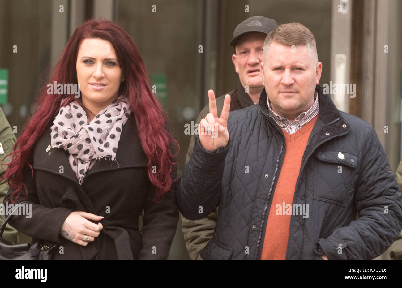 Belfast, Northern Ireland, U.K. 10th Jan 2018. Britain First's leader Paul Golding making his first court appearance after being charged with using 'threatening, abusive, insulting words or behaviour' following a speech he gave at a rally organised by Independent Belfast City Councillor Jolene Bunting last year. Golding was accompanied by Jayda Fransen and supporters. Credit: John Rymer/Alamy Live News Stock Photo