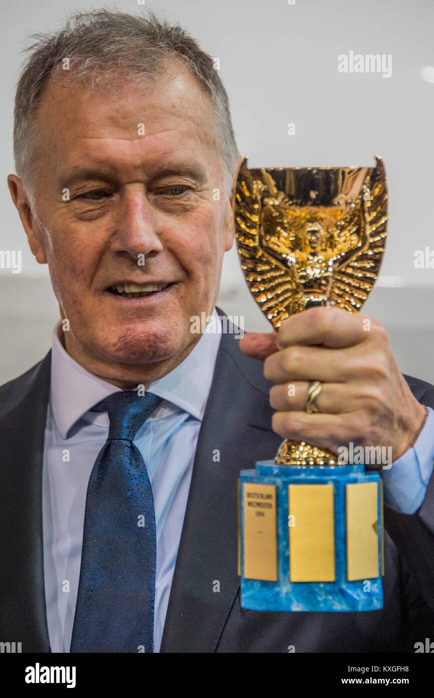 London, UK. 10th Jan, 2018. Sir Geoff Hurst and the Jules Rimet trophy at the Sunseeker launch and announcement of the partnership with FIFA for the 2018 World Cup - The London Boat Show 2018 opens at the Excel centre in the Docklands. Credit: Guy Bell/Alamy Live News Stock Photo