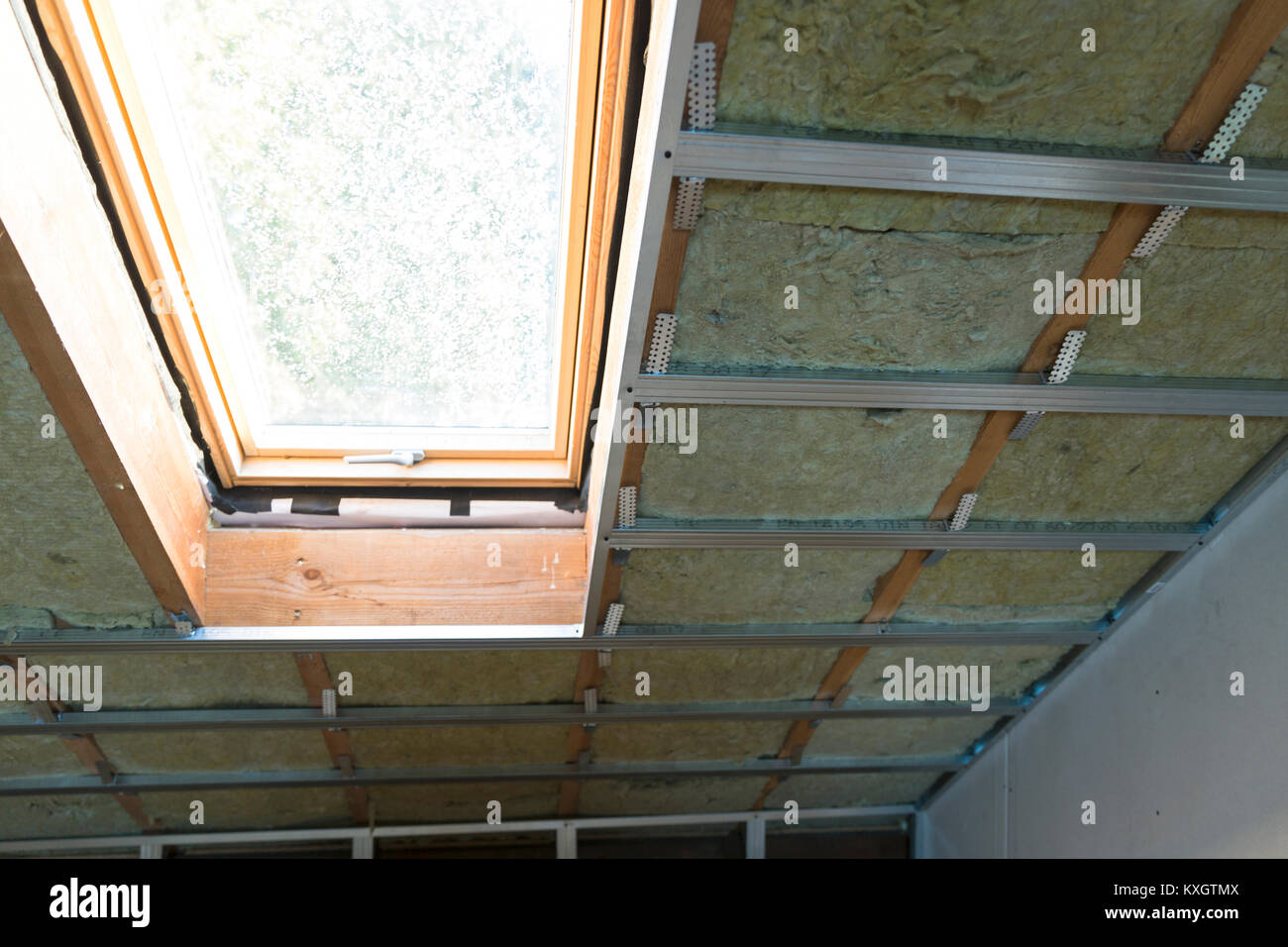 House Attic Under Construction Mansard Wall Insulation With Rock