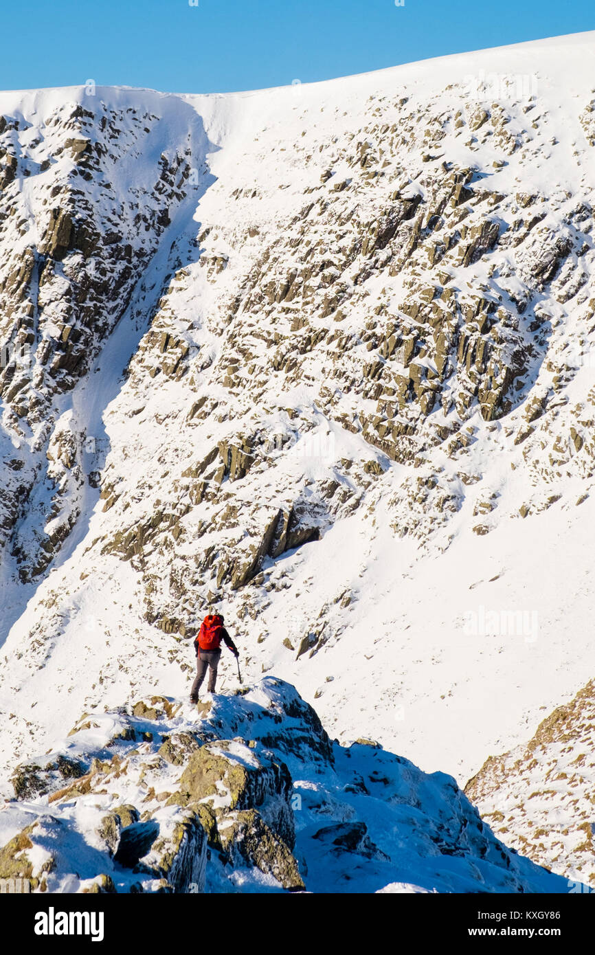 Heeling Ridge A Mountaineer taking on Striding Edge Ridge on The Helvellyn Mountain ...