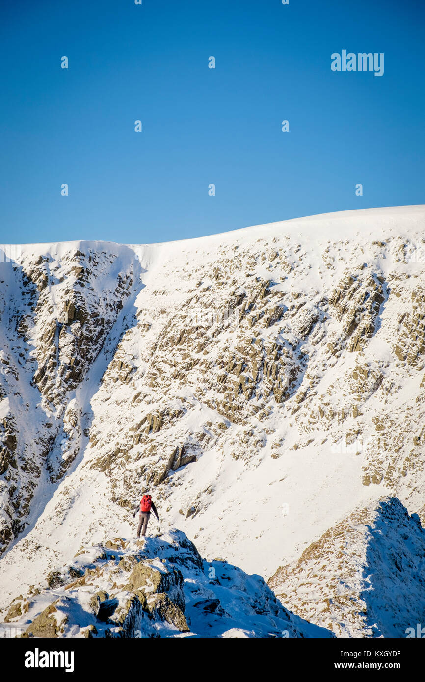 Heeling Ridge A Mountaineer taking on Striding Edge Ridge on The Helvellyn Mountain ...