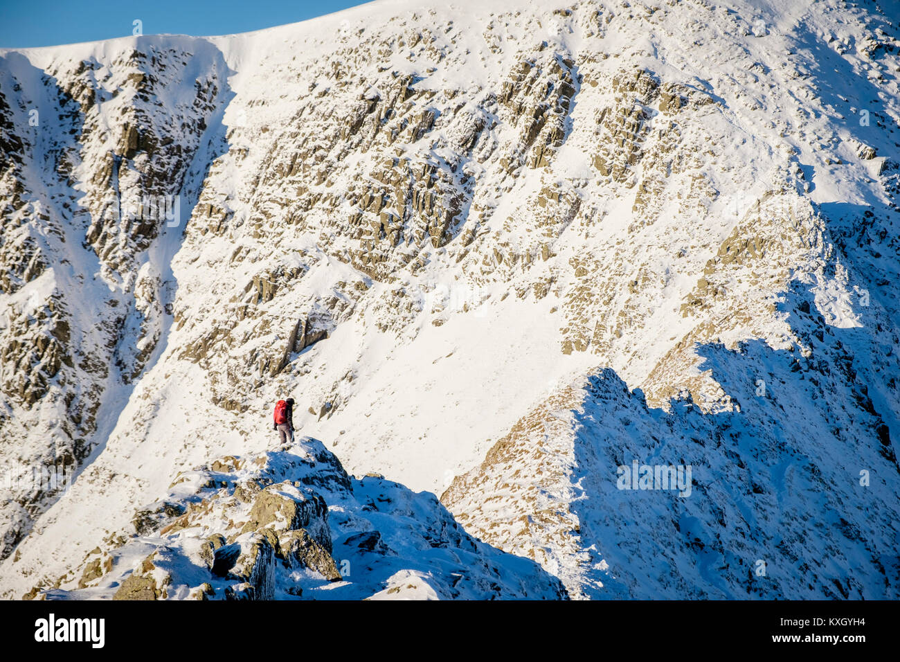 Heeling Ridge A Mountaineer taking on Striding Edge Ridge on The Helvellyn Mountain ...