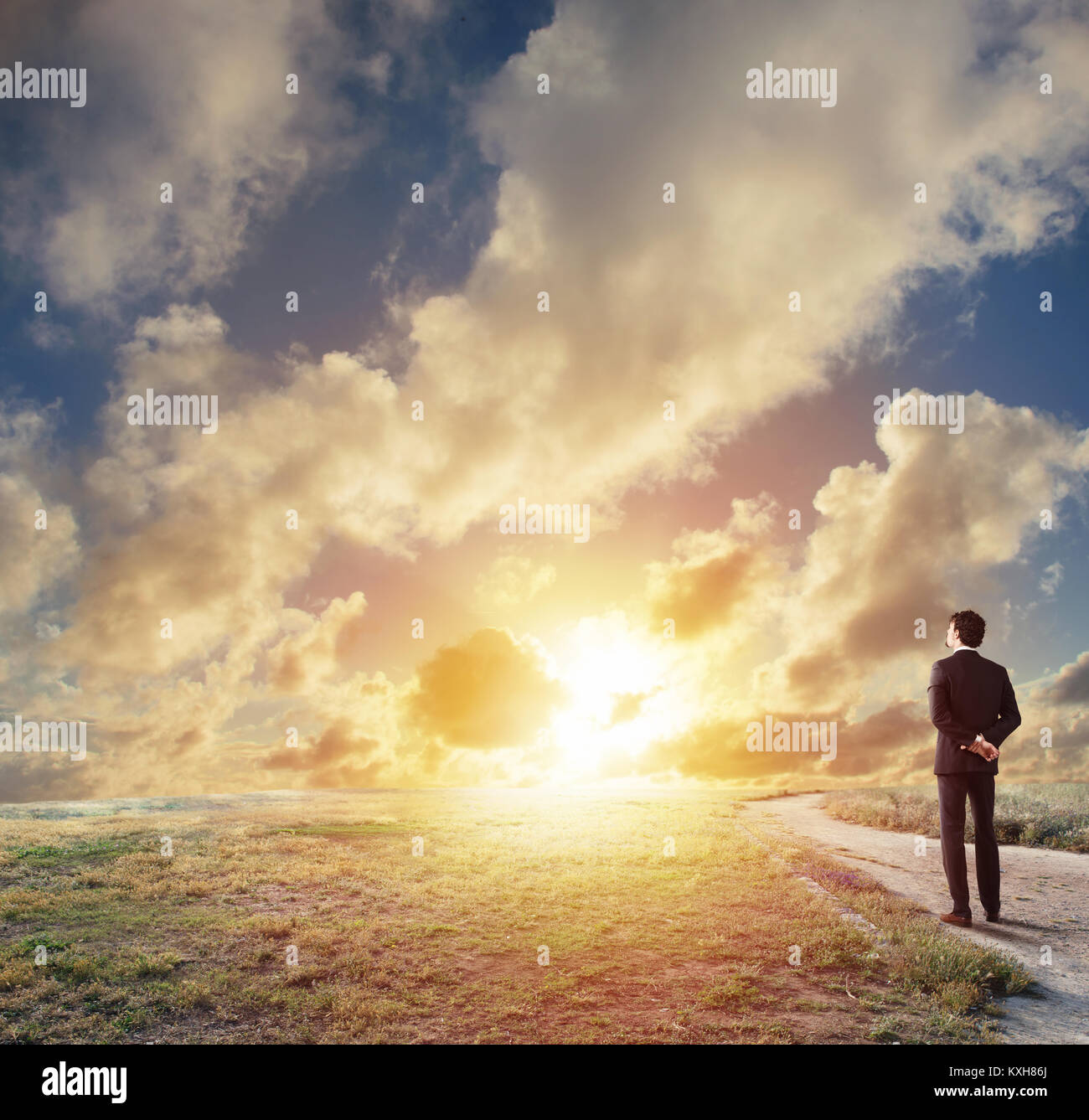 Businessman looking to the future for new business opportunity Stock Photo