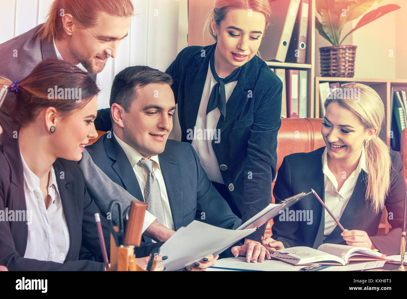 Happy group business people in office Stock Photo - Alamy