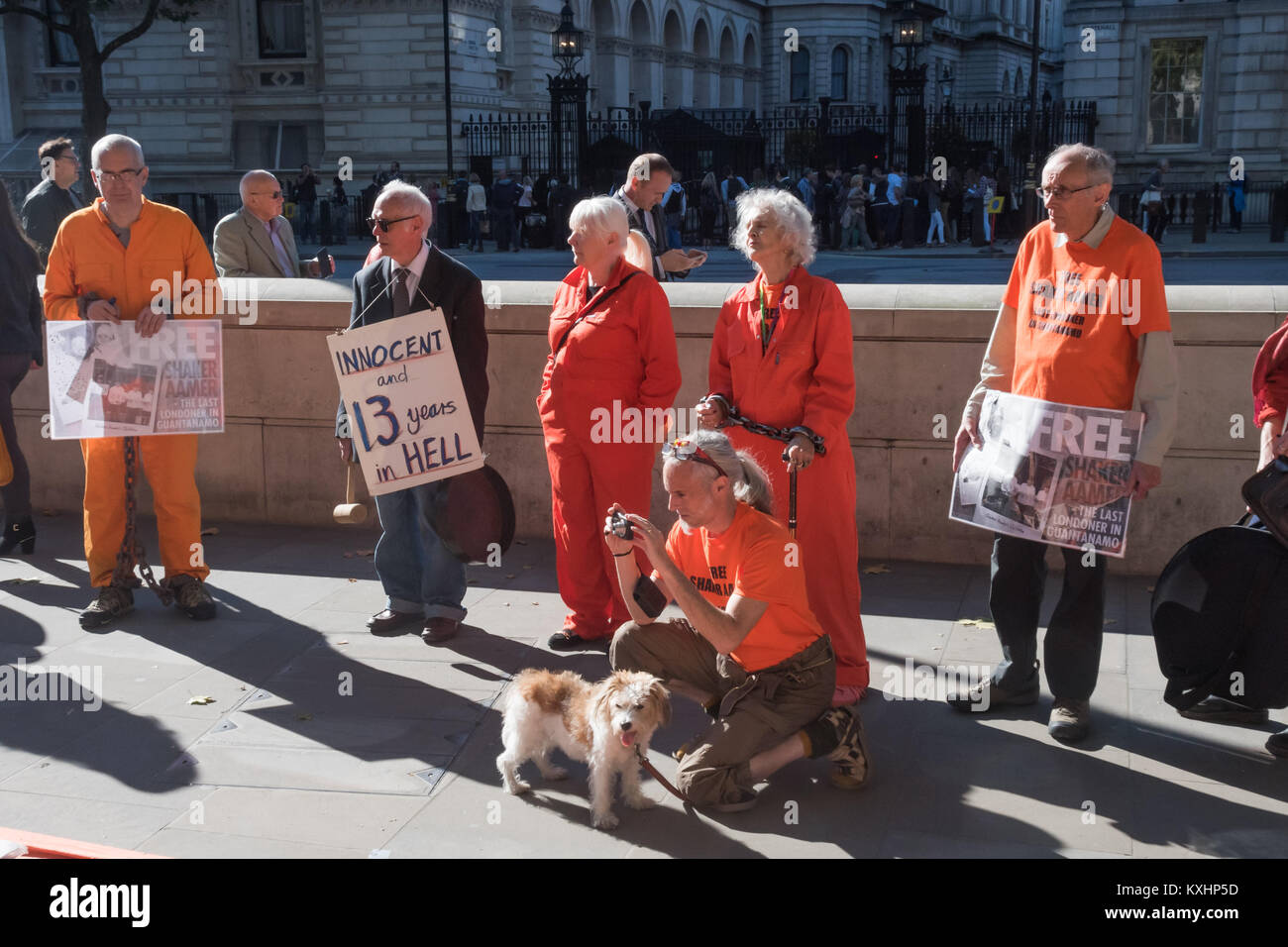 Protesters opposite Downing St listen to speeches as the Save Shaker Aamer Campaign who have held weekly vigils at Parliament celebrate the news of his forthcoming release. Stock Photo