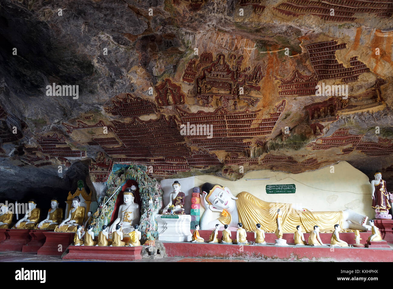 HPA AN, MYANMAR - CIRCA APRIL 2017 Buddhas in Kaw Goon cave Stock Photo