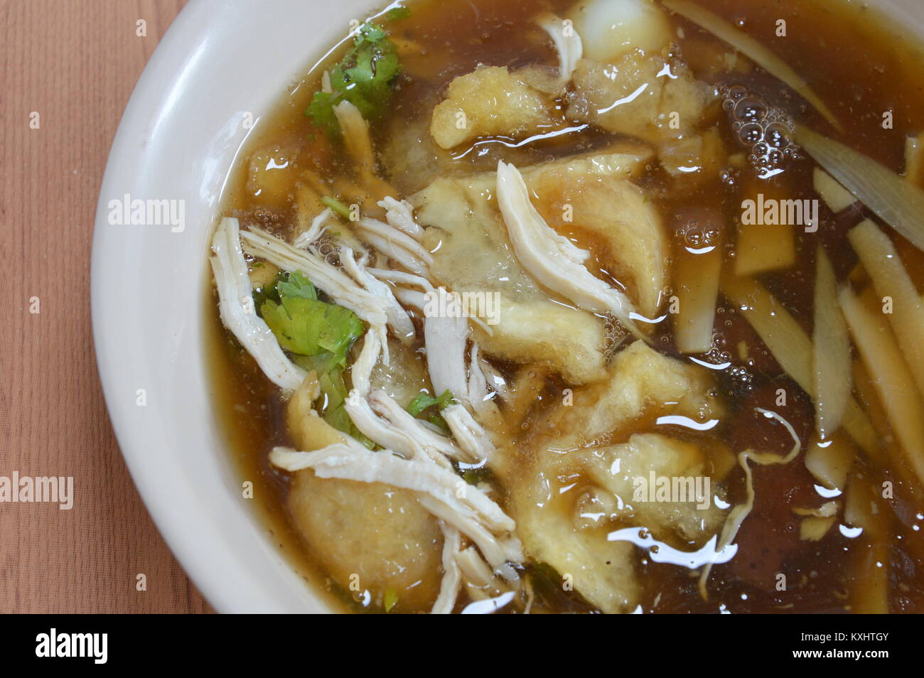 braised fish maw in red gravy on bowl Stock Photo Alamy