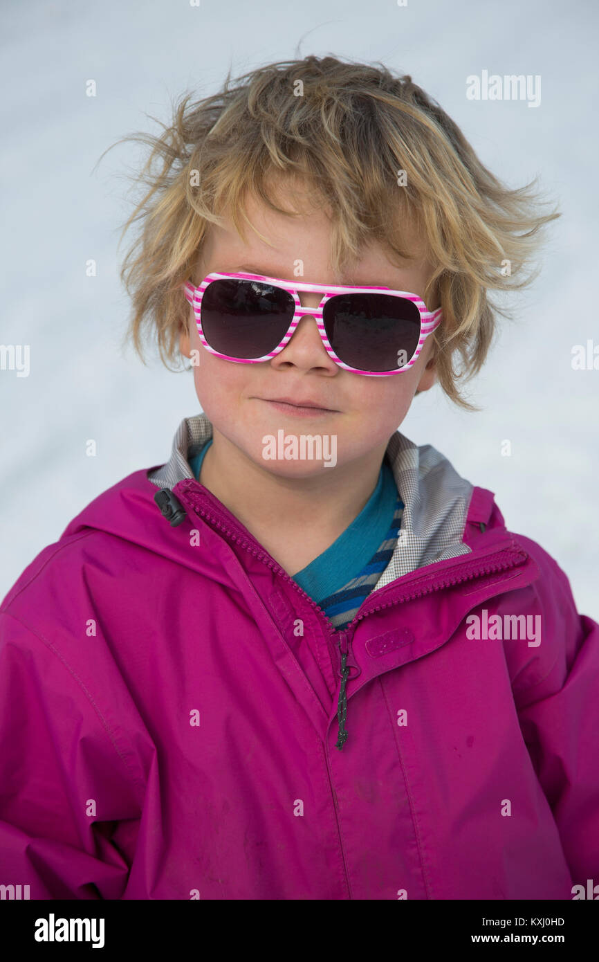 Close-up portrait of boy wearing sunglasses Stock Photo